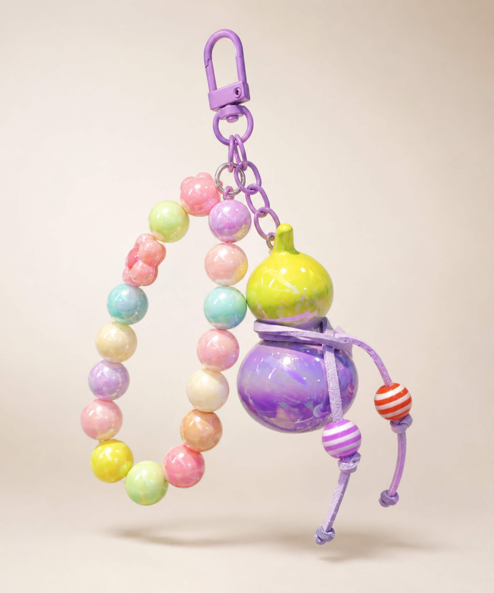 Purple whale beaded keychain with glossy purple beads, bow charm and heart detail
